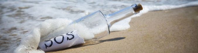 Sos-bottle-on-beach