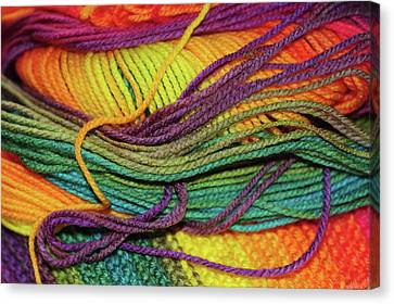 wriggling skein-of-rainbow-colored-threads-knitting-passion-jenny-rainbow-canvas-print - Copy