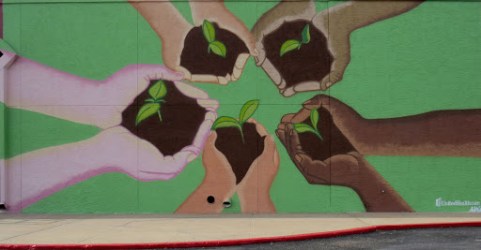 community garden calling hands